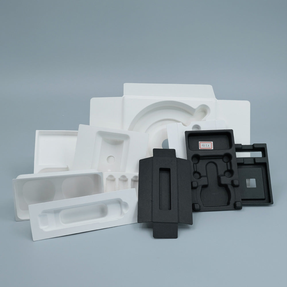 Audífonos inalámbricos ecológicos con bandeja interior moldeada de papel negro biodegradable