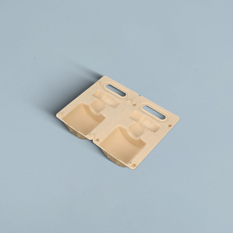 Envase de botella de pulpa moldeada con asa