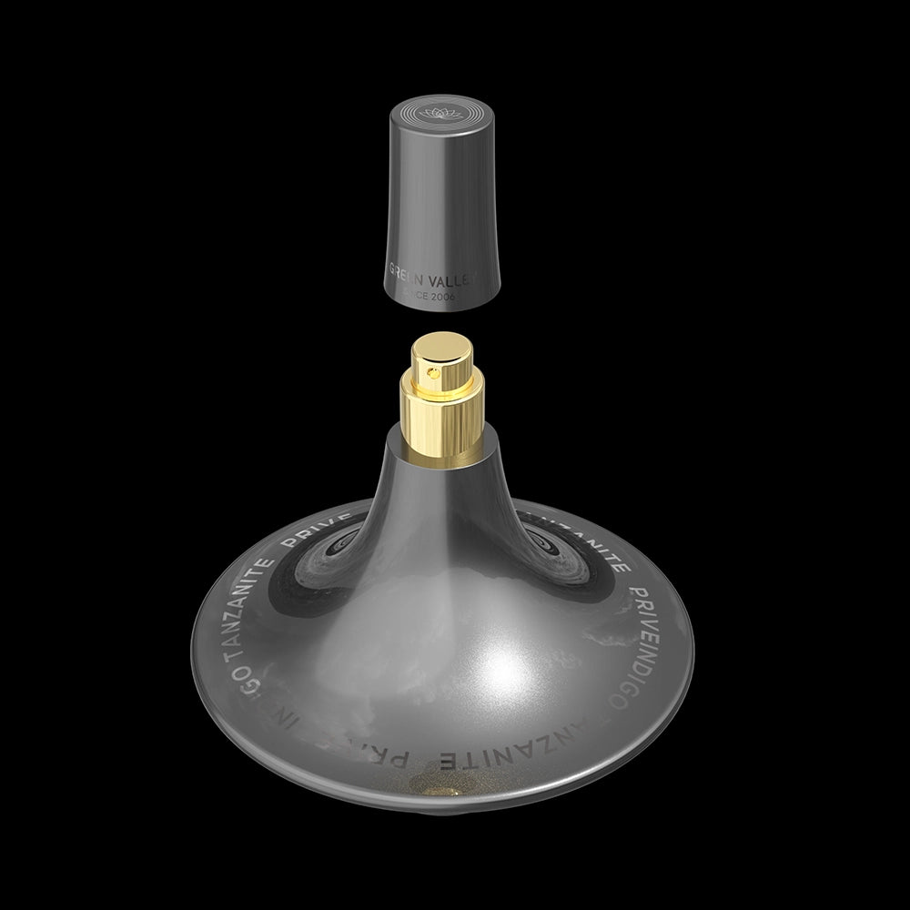 Perfume en forma de OVNI con tapa de almeja, embalaje de pulpa ecológica